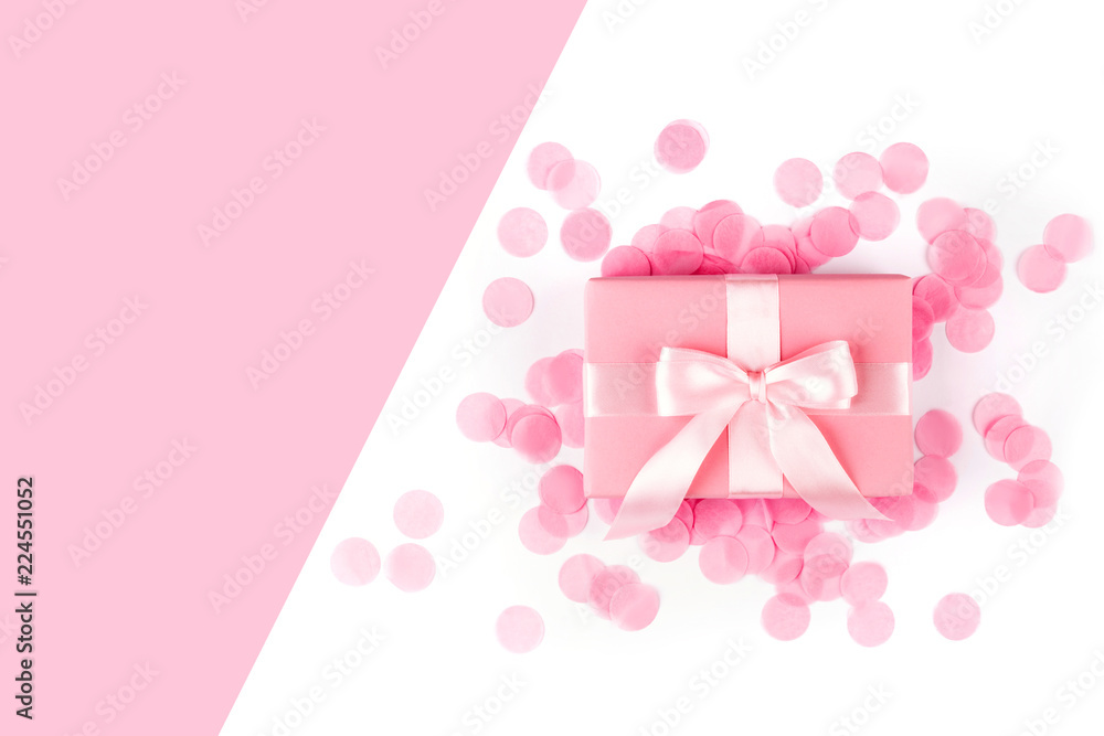 Present box with pink bow on white background. Present box with pink bow on white background.