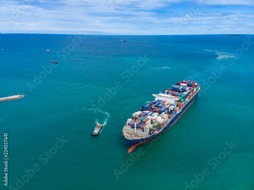 Aerial top eye view freighter container cargo import export on the sea from drone