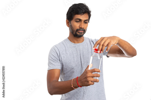 Man opening or closing water bottle