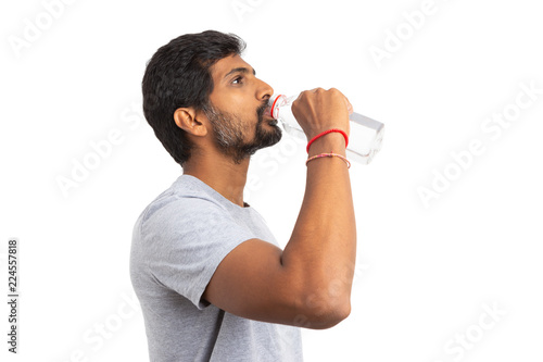 Indian man drinking water