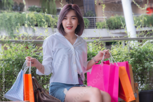 girl's like shopping , happy girl's on nice holiday , asian girl's holding shopping bags