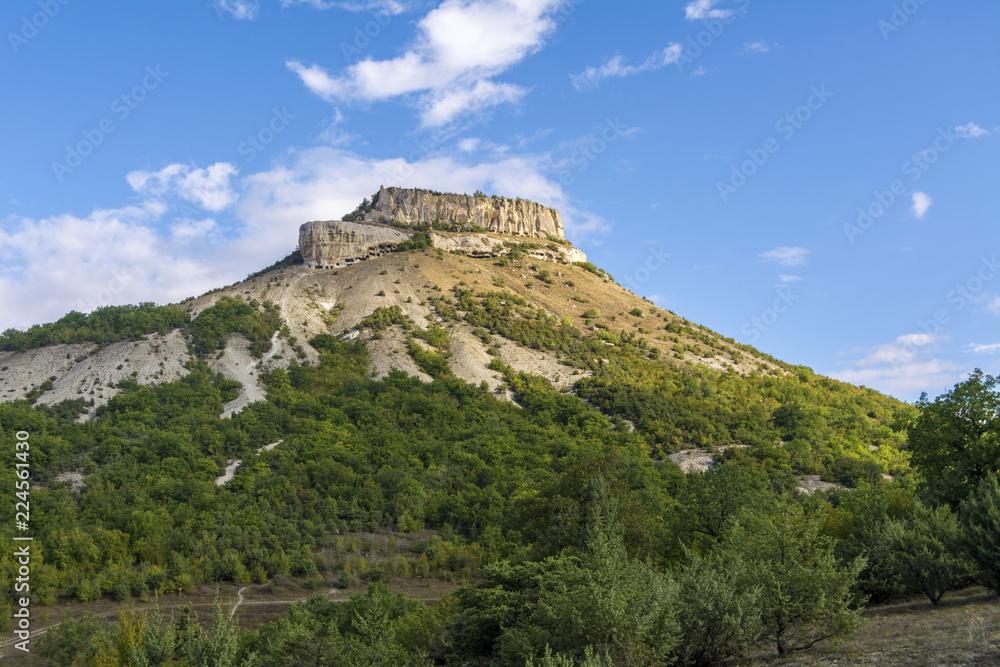 Ancient cave city on mount Tepe-Kermen in Crimea