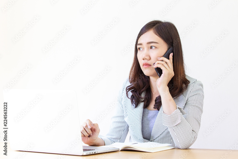 Asian business women age between 25-30 years old is using the smartphone. Asian business women age between 25-30 years old is using the smartphone.