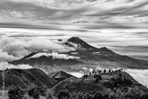 Mount Merapi and Merbabu in the background taken from mount Prau, Jogjakarta, Indonesia in black and white. photo