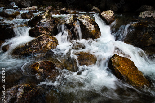 wild mountain stream between stones