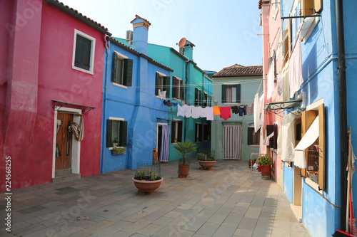 clothes on a courtyard between the houses of Burano © ChiccoDodiFC