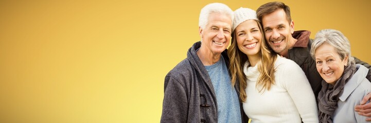 Composite image of  happy family standing together and smiling