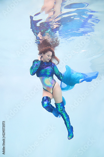 Underwater Portrait of a Woman Wearing Sequin Boots