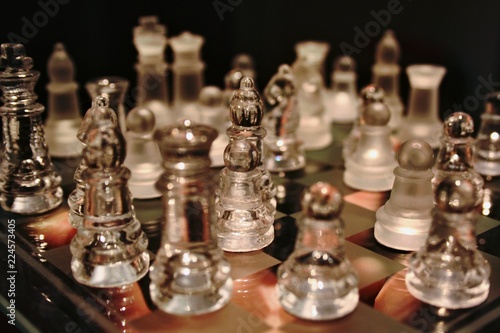 Transparent chess in chess board.