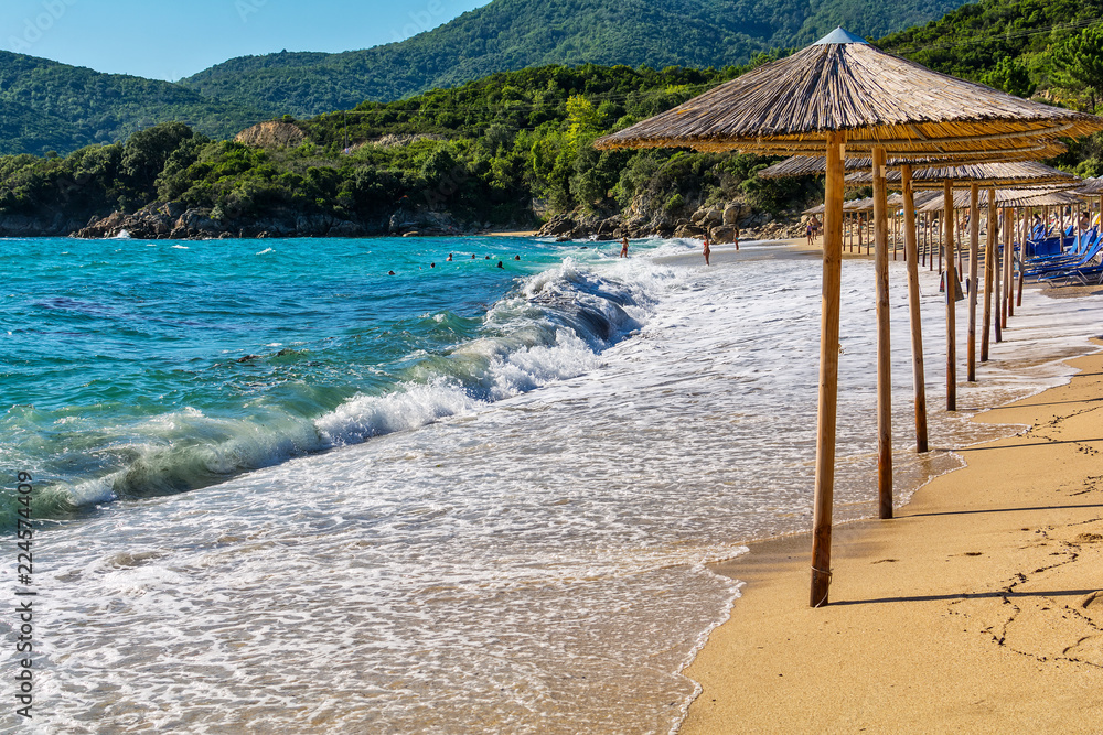 Naklejka premium Olympiada, Greece - August 11, 2018: Proti Ammoudia beach, one of the most beautiful beaches in the Aegean Sea.