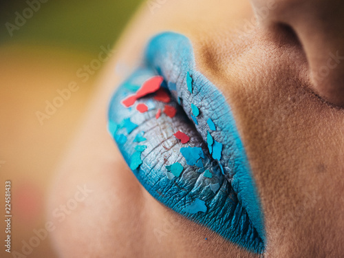 Fashion and beauty. Creative lip makeup. Artistic make-up. Beautiful macro shot of female plump lips.