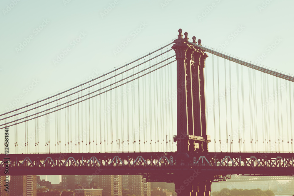Naklejka premium Rocznika koloru widok Manhattan most przy wschodem słońca, Miasto Nowy Jork, Nowy Jork, usa