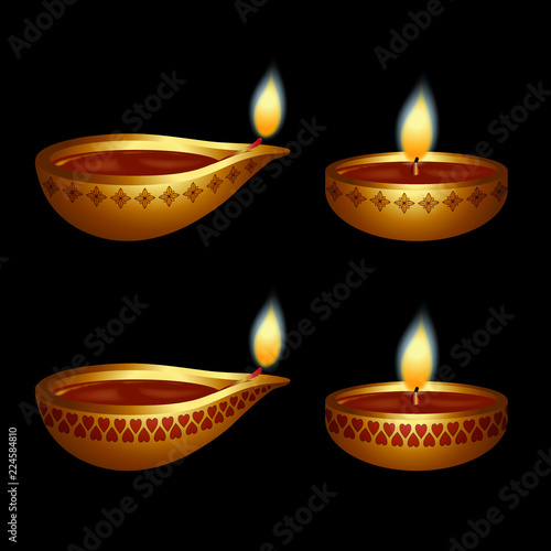 Bougies dans des petits pots décorés de lignes et de fleurs, pour la fête des lumière en Inde, Diwali.