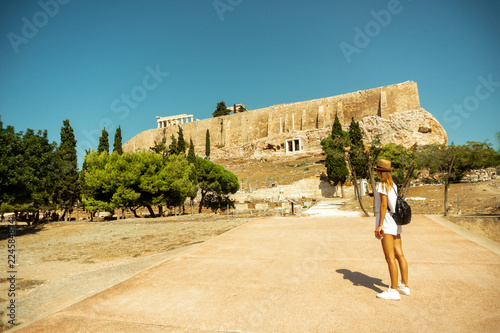 girl goes to the ancient Greek Acropolis