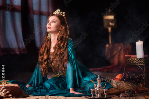 Girl at the image of Turkish sultan's wife