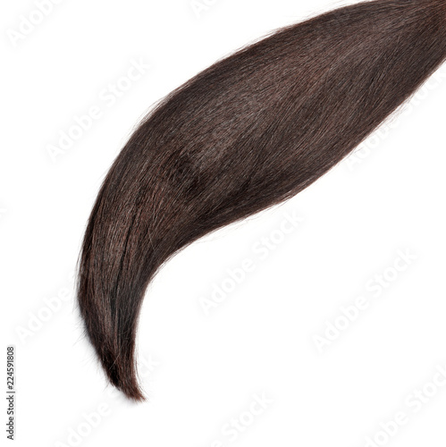 Lock of healthy brown hair on white background