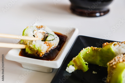 Sushi roll with eel and avo...