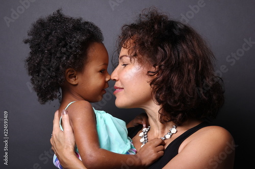 Mother with a daughter with afro hair