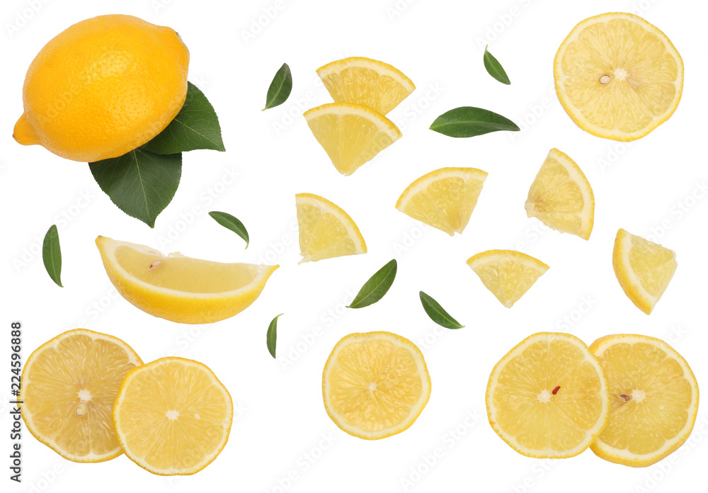 Lemon with leaf and slices isolated on white background. Lay Flat, top view Lemon with leaf and slices isolated on white background. Lay Flat, top view