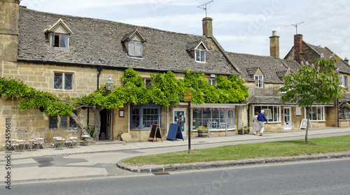 Iconic espaliered tree in the quaint Cotswolds village of Broadway, Worcestershire, England photo