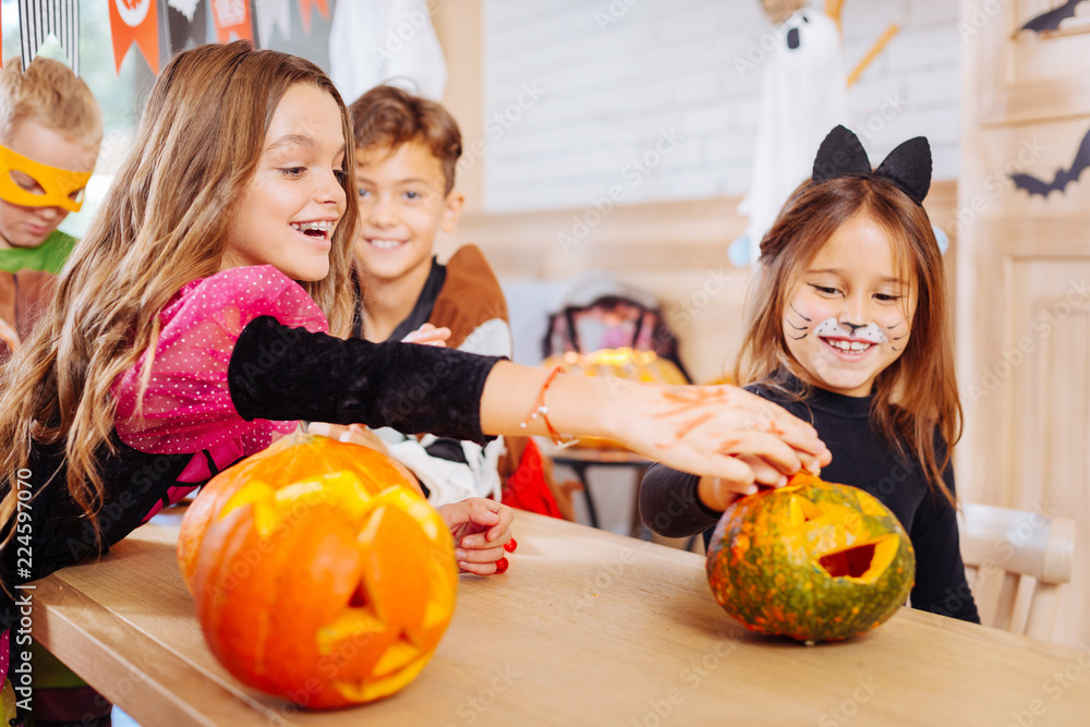 Cute girl. Little cute girl with painted face wearing cat costume for ...