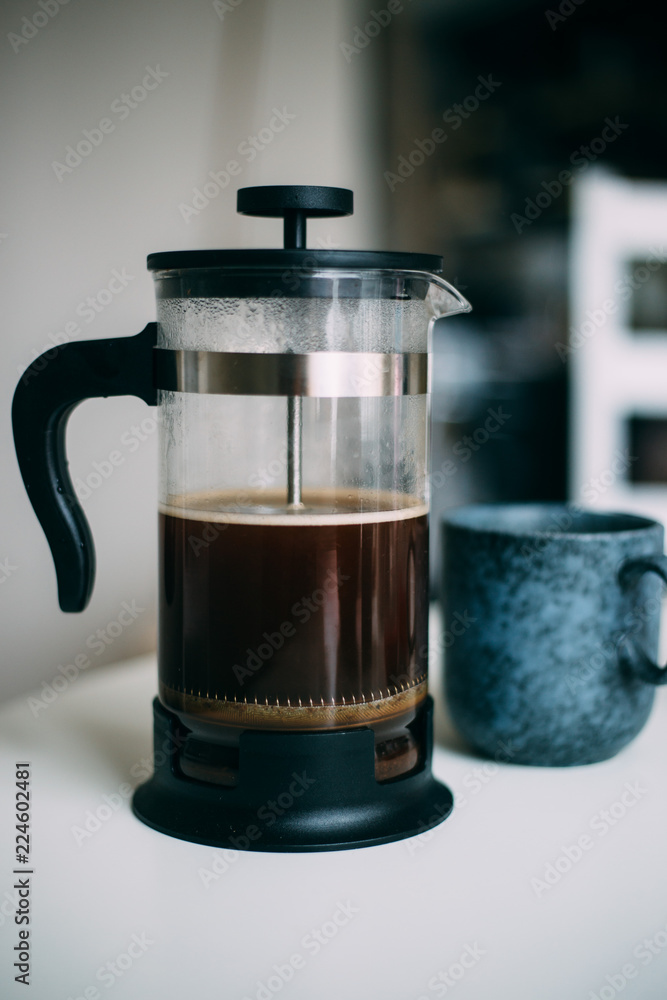 French Press Coffee Pour on a Cold Autumn Morning. French Press Coffee Pour on a Cold Autumn Morning.