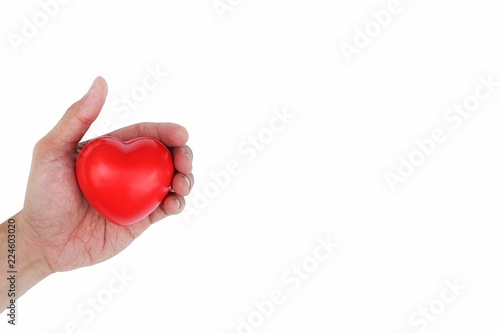 Fototapeta Naklejka Na Ścianę i Meble -  Man Hand holding Red Heart,Concept of Love and Health care,family insurance.World heart day, World health day.Valentine's day.isolated shape of heart on white background.