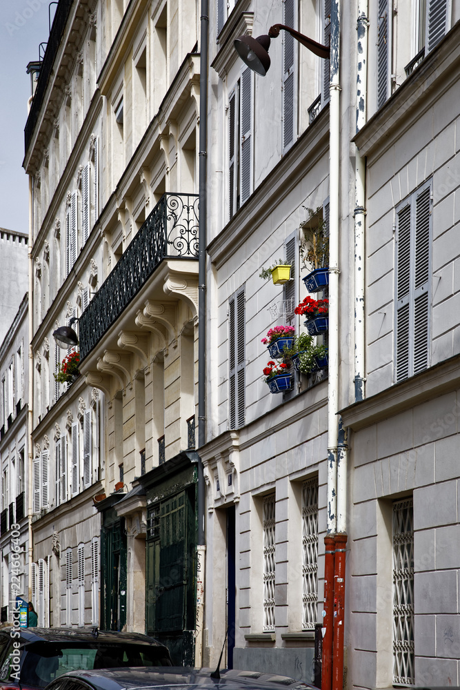 Paris, France - September 22, 2018: Typical buildings in famous neightbourhood Montmartre in Paris