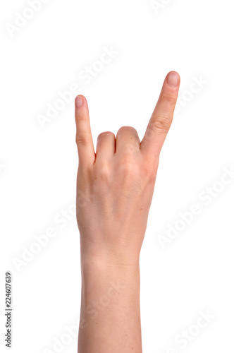 woman's hand showing Sign of the horns.isolated over white