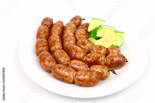 Easten thai sausage (Thai name is Sai Krok Isan) on white background.
ground pork with vermicelli,Rice and garlic  Sausage.