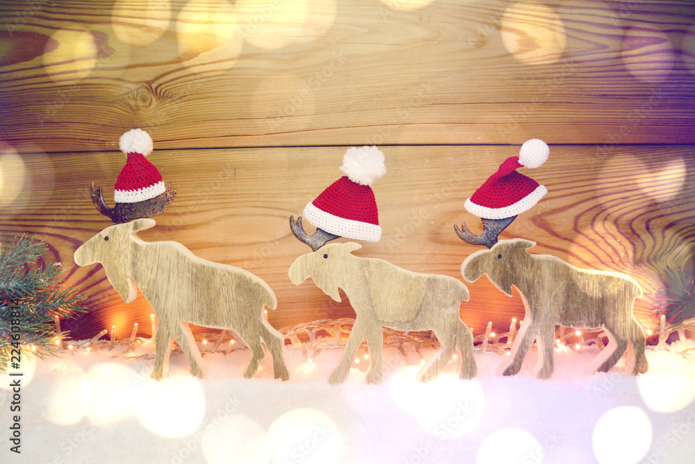Weihnachtskarte - drei Elche mit Mütze