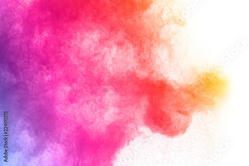 abstract powder splatted background. Colorful powder explosion on white background. Colored cloud. Colorful dust explode. Paint Holi. © kitsana