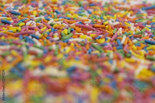 background of colorful candy sprinkles © Kaplygula