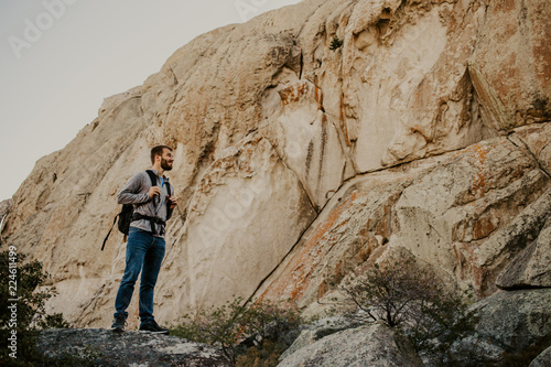 Man hiking in rocky mountains