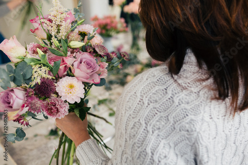 the florist finishing the bouquet