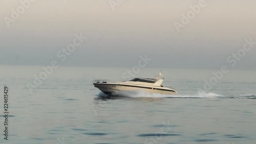 Slow motion close up yacht boat sailing moving sea horizon speed photo