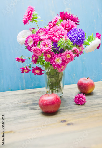 Wallpaper Mural bouquet of garden flowers in a vase on a wooden table and apples Torontodigital.ca