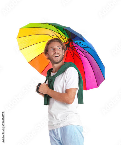 Man with rainbow umbrella on white background