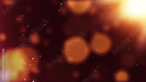 Abstract bokeh golden particles. VJ Seamless loop background.