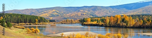 Panoramic view of the Irkut River on a September sunny day. Bright Autumn Landscape
