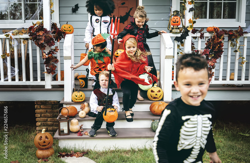 Little kids trick or treating photo