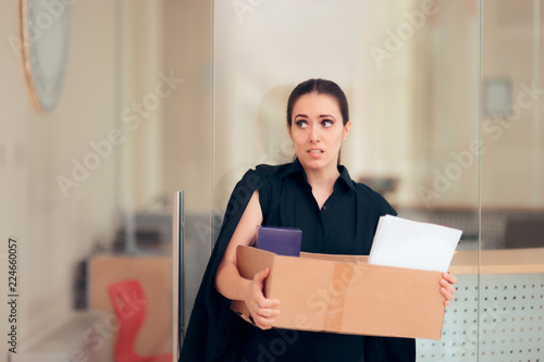 Office Employee Being Fired or Resigning after Work Conflict photo