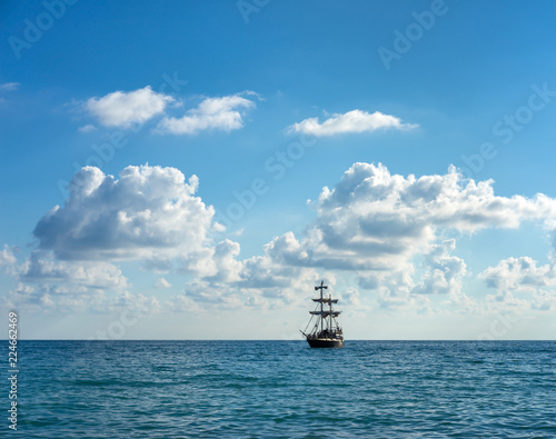 Old sailing ship in the sea photo