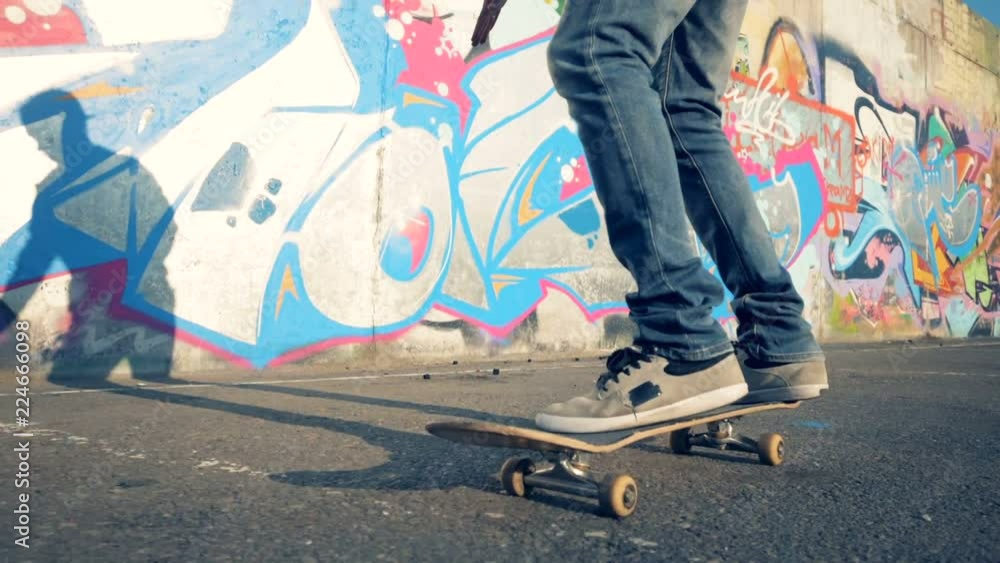 A skateboarder rides a skate, slow motion, steadicam shot. A skateboarder rides a skate, slow motion, steadicam shot.