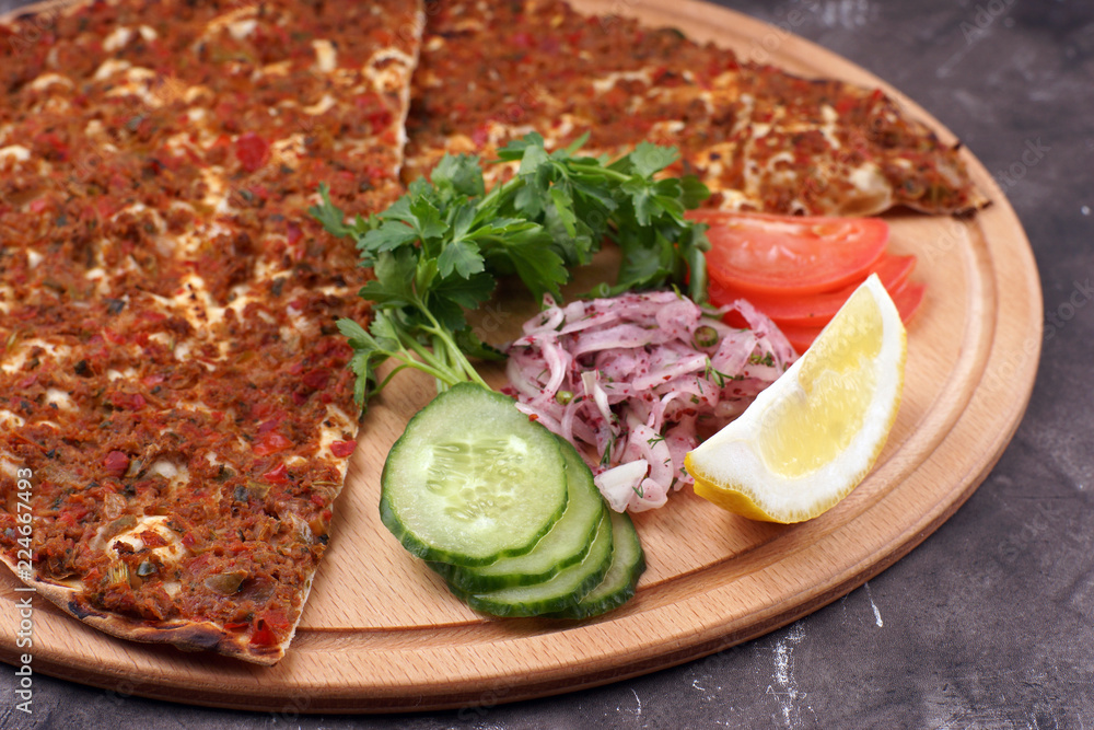 Turkish tortilla with meat and vegetables, called Lahmacun