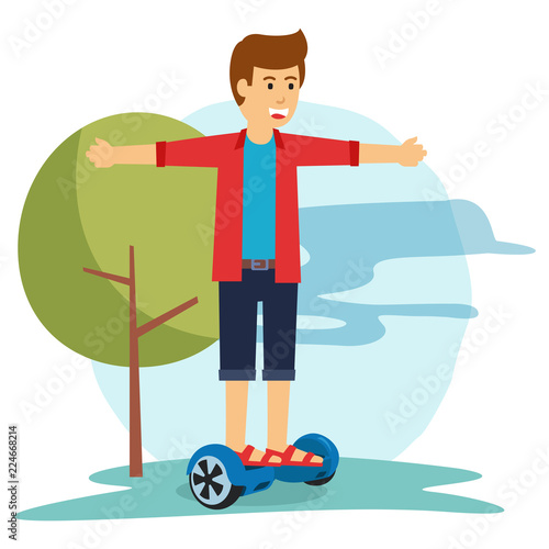 Happy guy rides hover board at the park 