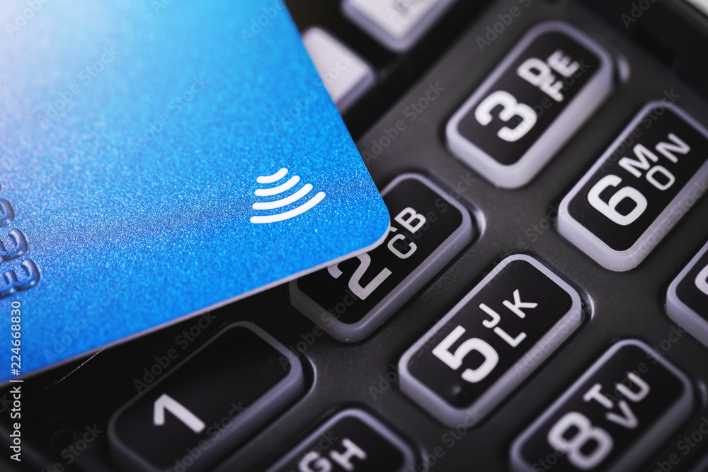 contactless payments - credit card on payment terminal contactless payments - credit card on payment terminal