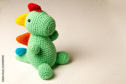 Cute Knitted dinosaur doll – amigurumi toy