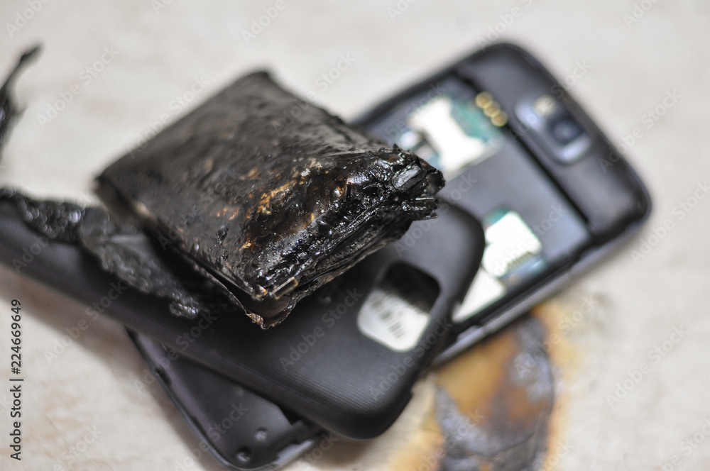 Mobile phone battery explodes and burns due to overheat. Danger