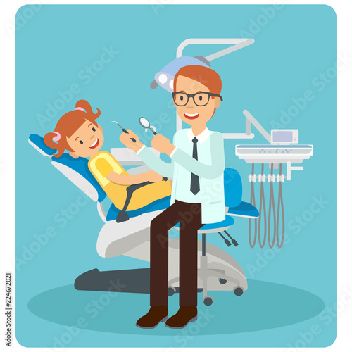 A male dentist examining a young girl teeth